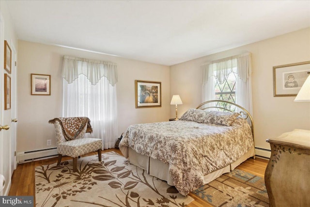 161 Bull Run Rd, Pennington, NJ 08534 - bedroom with a baseboard radiator and wood finished floors