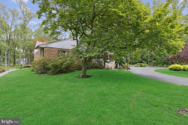 161 Bull Run Rd, Pennington, NJ 08534 - view of side of home with a yard and brick siding