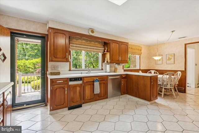 161 Bull Run Rd, Pennington, NJ 08534 - kitchen featuring dishwasher, a sink, light countertops, plenty of natural light, and a wainscoted wall