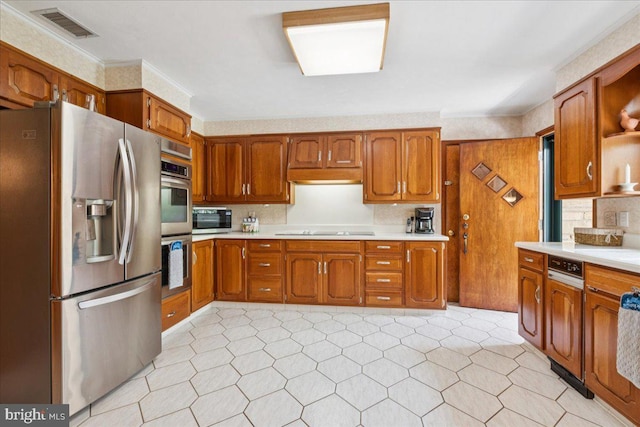 161 Bull Run Rd, Pennington, NJ 08534 - kitchen featuring stainless steel appliances, light countertops, brown cabinetry, decorative backsplash, and open shelves
