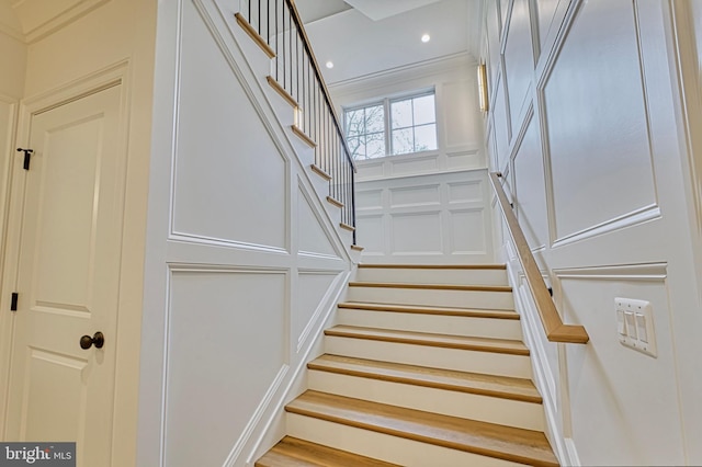 4740 34th Rd N, Arlington, VA 22207 - staircase featuring a decorative wall and recessed lighting