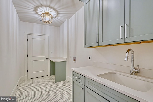 4740 34th Rd N, Arlington, VA 22207 - laundry area featuring hookup for a washing machine, hookup for an electric dryer, cabinet space, a chandelier, and baseboards