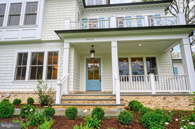 4740 34th Rd N, Arlington, VA 22207 - view of exterior entry with a balcony and a porch