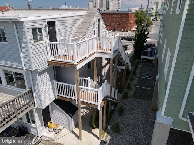1617 Saint Louis Ave, Ocean City, MD 21842 - back of property featuring stairs and a wooden deck
