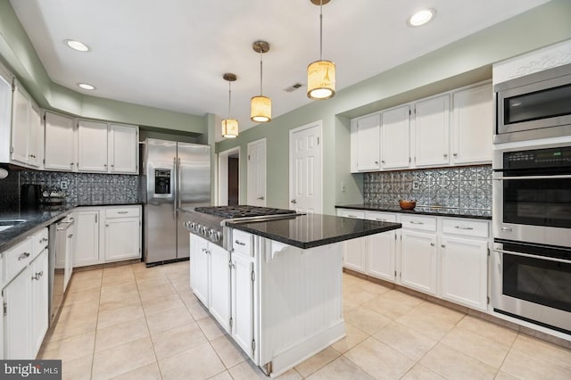 6 Keystone Way, Princeton Junction, NJ 08550 - kitchen with appliances with stainless steel finishes, white cabinets, light tile patterned flooring, decorative backsplash, and recessed lighting