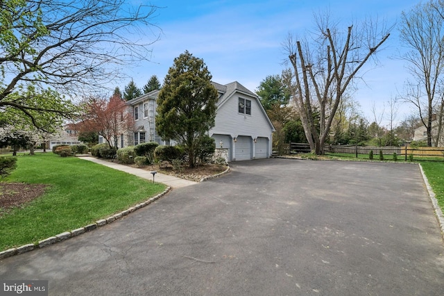 6 Keystone Way, Princeton Junction, NJ 08550 - view of side of home featuring asphalt driveway and an attached garage