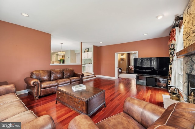 6 Keystone Way, Princeton Junction, NJ 08550 - living area with a fireplace, wood finished floors, and baseboards
