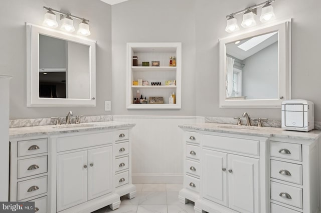 6 Keystone Way, Princeton Junction, NJ 08550 - full bath with marble finish floors, two vanities, and a wainscoted wall