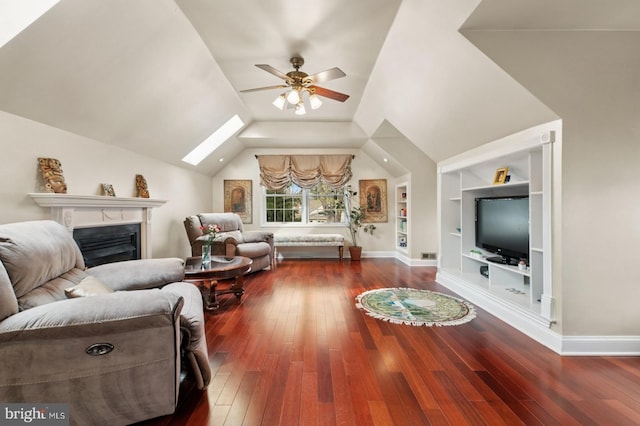 6 Keystone Way, Princeton Junction, NJ 08550 - living room with wood-type flooring, built in features, ceiling fan, a skylight, and vaulted ceiling