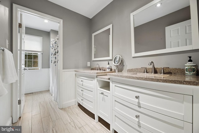 6 Keystone Way, Princeton Junction, NJ 08550 - bathroom with double vanity, a wainscoted wall, and a shower with curtain