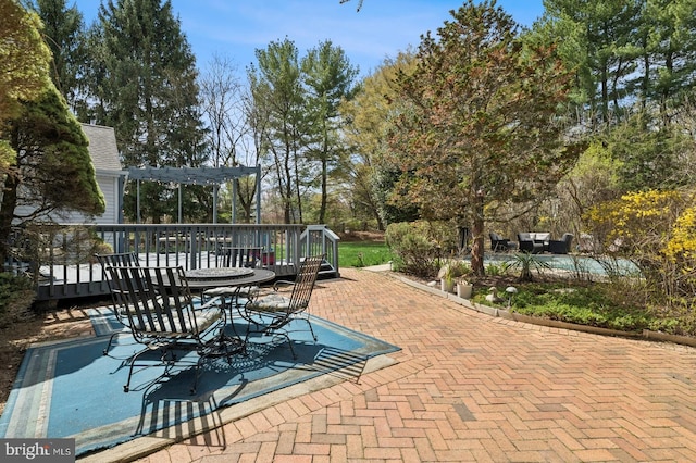 6 Keystone Way, Princeton Junction, NJ 08550 - view of patio / terrace featuring a pergola, a wooden deck, view of scattered trees, and outdoor dining area