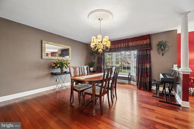 6 Keystone Way, Princeton Junction, NJ 08550 - dining space featuring decorative columns, a chandelier, and hardwood / wood-style flooring