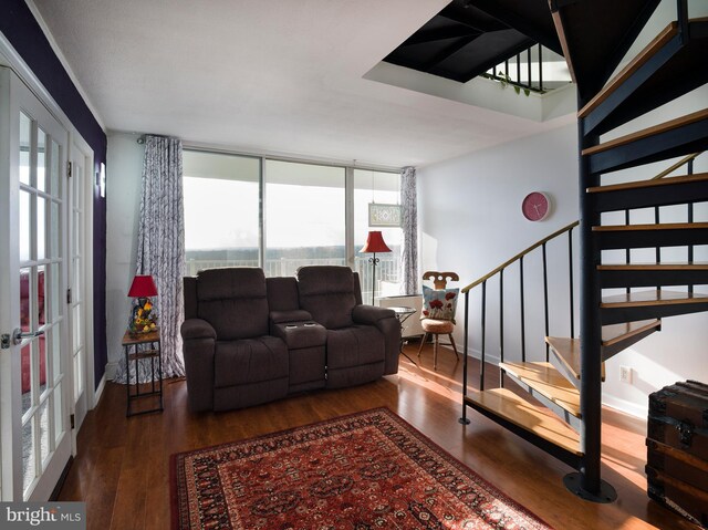 3900 Ford Rd Unit 21E & 20E, Philadelphia, PA 19131 - living area with wood finished floors and stairway