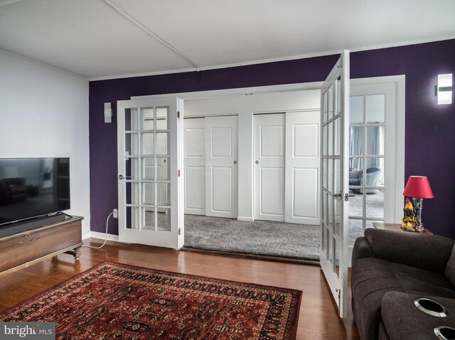 3900 Ford Rd Unit 21E & 20E, Philadelphia, PA 19131 - living area featuring french doors, wood finished floors, baseboards, and ornamental molding