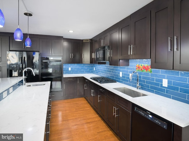 3900 Ford Rd Unit 21E & 20E, Philadelphia, PA 19131 - kitchen with black appliances, a sink, decorative backsplash, and recessed lighting