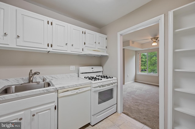 10528 Cross Fox Ln Unit D-2, Columbia, MD 21044 - kitchen featuring white appliances, a sink, under cabinet range hood, light carpet, and a ceiling fan