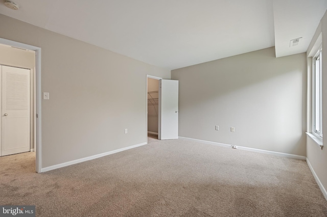 10528 Cross Fox Ln Unit D-2, Columbia, MD 21044 - carpeted spare room featuring a smoke detector and baseboards