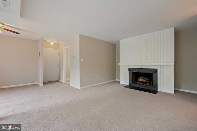 10528 Cross Fox Ln Unit D-2, Columbia, MD 21044 - unfurnished living room with carpet flooring, a fireplace, a ceiling fan, and baseboards