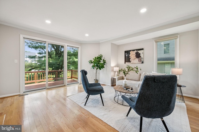 5071 Columbia Rd, Columbia, MD 21044 - living area featuring ornamental molding, light wood-style floors, baseboards, and recessed lighting