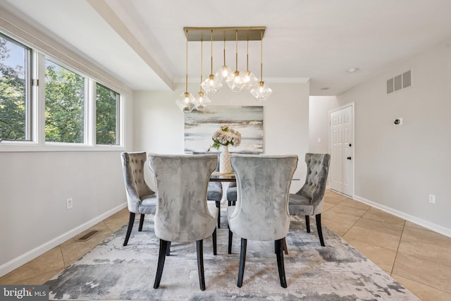 5071 Columbia Rd, Columbia, MD 21044 - tiled dining room featuring a chandelier and baseboards