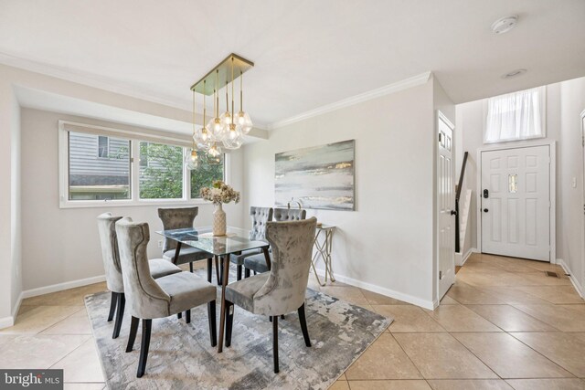 5071 Columbia Rd, Columbia, MD 21044 - dining room featuring a chandelier, light tile patterned floors, ornamental molding, and baseboards