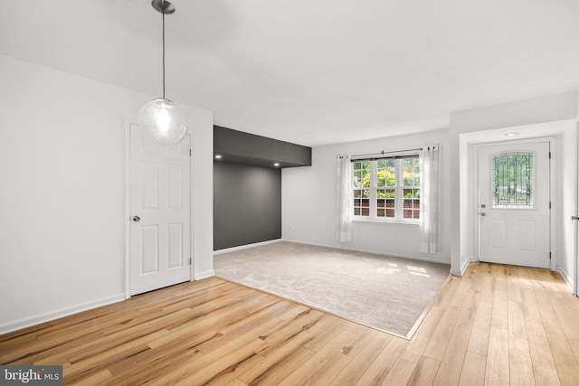 7556 S Arbory Ln Unit 382, Laurel, MD 20707 - foyer entrance with wood finished floors and baseboards