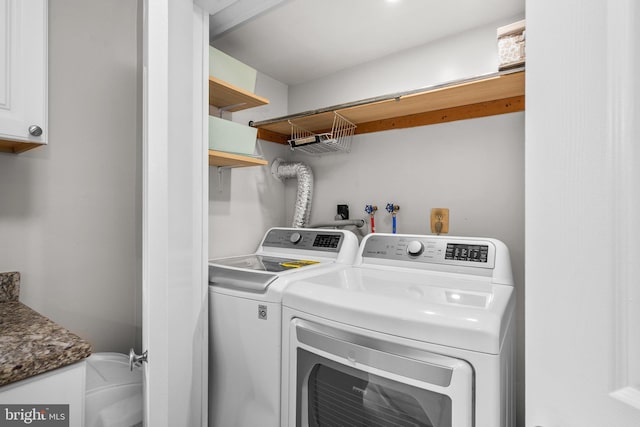 7556 S Arbory Ln Unit 382, Laurel, MD 20707 - washroom with washing machine and dryer and cabinet space