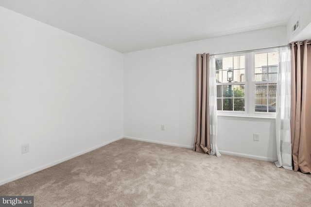 7556 S Arbory Ln Unit 382, Laurel, MD 20707 - spare room featuring carpet and a textured ceiling