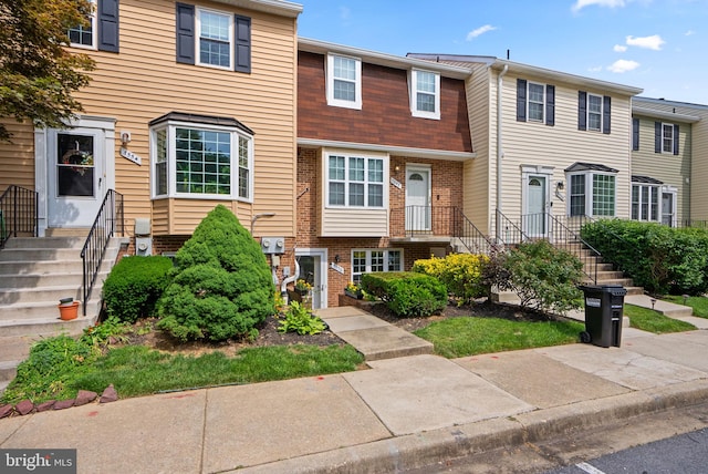 7556 S Arbory Ln Unit 382, Laurel, MD 20707 - townhome / multi-family property featuring brick siding