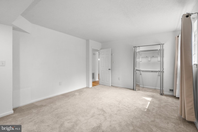 7556 S Arbory Ln Unit 382, Laurel, MD 20707 - unfurnished bedroom featuring carpet floors, a textured ceiling, and a closet