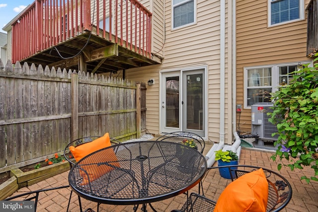 7556 S Arbory Ln Unit 382, Laurel, MD 20707 - view of patio featuring outdoor dining space and a deck