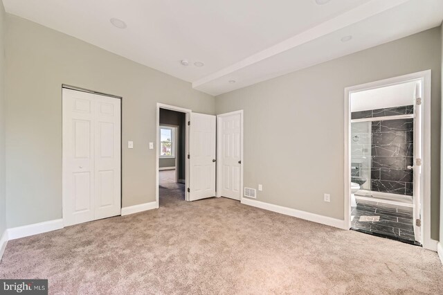 3711 Spaulding Ave, Baltimore, MD 21215 - unfurnished bedroom with carpet flooring, baseboards, and ensuite bath