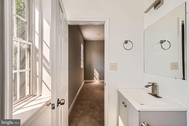 3711 Spaulding Ave, Baltimore, MD 21215 - bathroom with vanity and baseboards