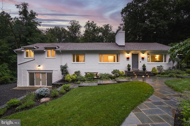 4604 Park Rd, Alexandria, VA 22312 - ranch-style home with a chimney, a yard, and brick siding
