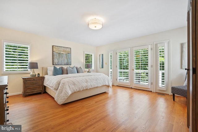 4604 Park Rd, Alexandria, VA 22312 - bedroom featuring access to exterior and light wood finished floors