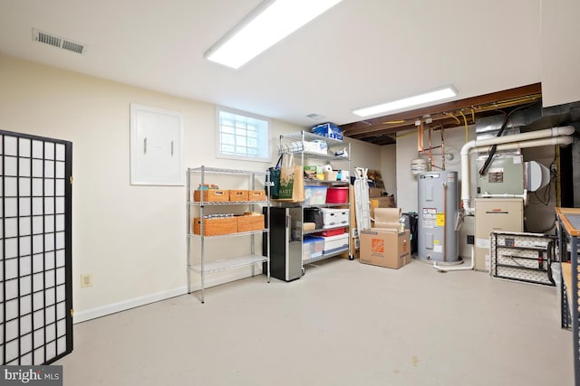 4604 Park Rd, Alexandria, VA 22312 - basement featuring electric water heater and heating unit