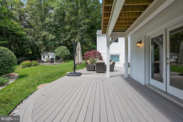 4604 Park Rd, Alexandria, VA 22312 - wooden deck featuring an outbuilding, a yard, and french doors