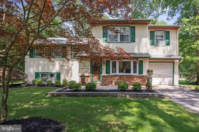155 Ridge Rd, Southampton, NJ 08088 - view of front of house featuring a garage, driveway, a front yard, and brick siding