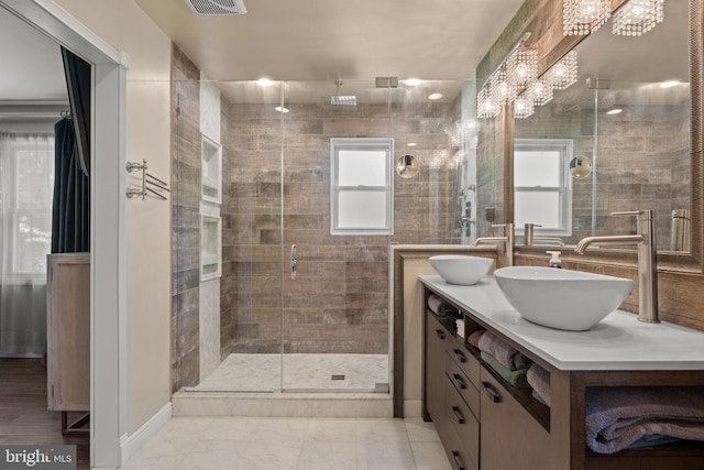 155 Ridge Rd, Southampton, NJ 08088 - full bath with double vanity, a stall shower, and a chandelier