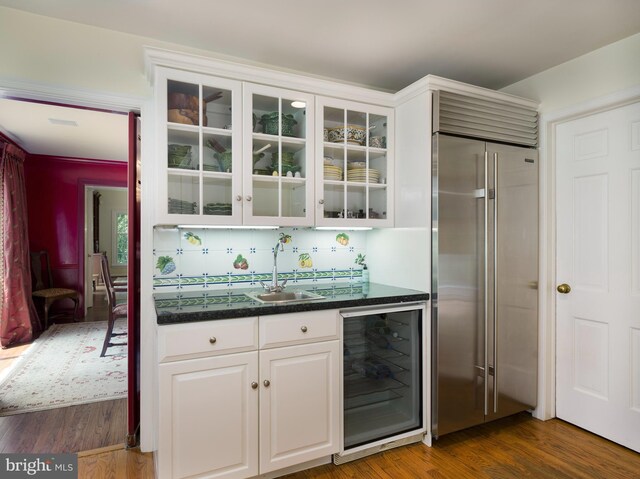 825 Parkes Run Ln, Villanova, PA 19085 - indoor wet bar featuring stainless steel built in fridge, beverage cooler, and dark wood-type flooring