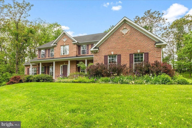 10840 Wolfsville Rd, Myersville, MD 21773 - view of front of home featuring a front lawn and brick siding