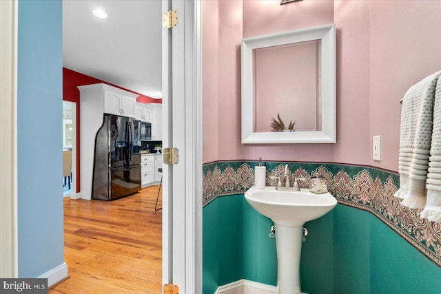 10840 Wolfsville Rd, Myersville, MD 21773 - bathroom with wood finished floors