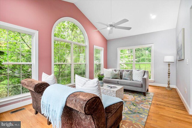 10840 Wolfsville Rd, Myersville, MD 21773 - living area with ceiling fan, baseboards, light wood-style flooring, and high vaulted ceiling