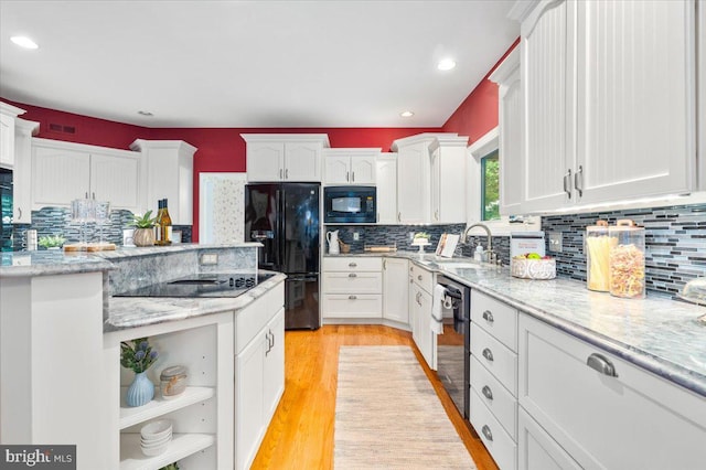 10840 Wolfsville Rd, Myersville, MD 21773 - kitchen featuring black appliances, a sink, white cabinetry, decorative backsplash, and recessed lighting