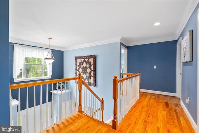 10840 Wolfsville Rd, Myersville, MD 21773 - corridor with an upstairs landing, wood finished floors, baseboards, and crown molding