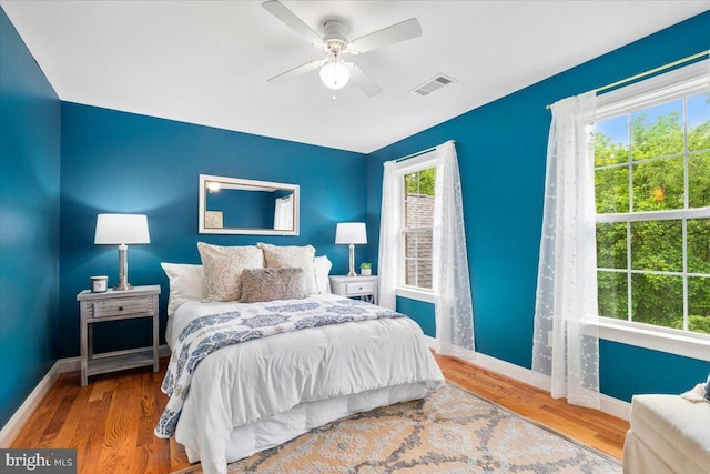 10840 Wolfsville Rd, Myersville, MD 21773 - bedroom with baseboards, wood finished floors, and a ceiling fan