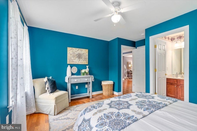 10840 Wolfsville Rd, Myersville, MD 21773 - bedroom featuring wood finished floors, a ceiling fan, and baseboards