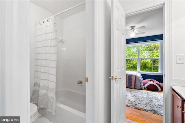 10840 Wolfsville Rd, Myersville, MD 21773 - bathroom featuring shower / bath combo, ceiling fan, toilet, vanity, and wood finished floors