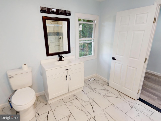 6 W Griffith St, Penns Grove, NJ 08069 - full bathroom with vanity, marble look tile flooring, toilet, and baseboards
