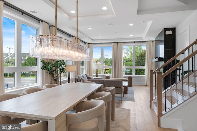 1632 Chain Bridge Rd, Mclean, VA 22101 - dining area featuring a tray ceiling, plenty of natural light, light wood-style floors, ornamental molding, and recessed lighting